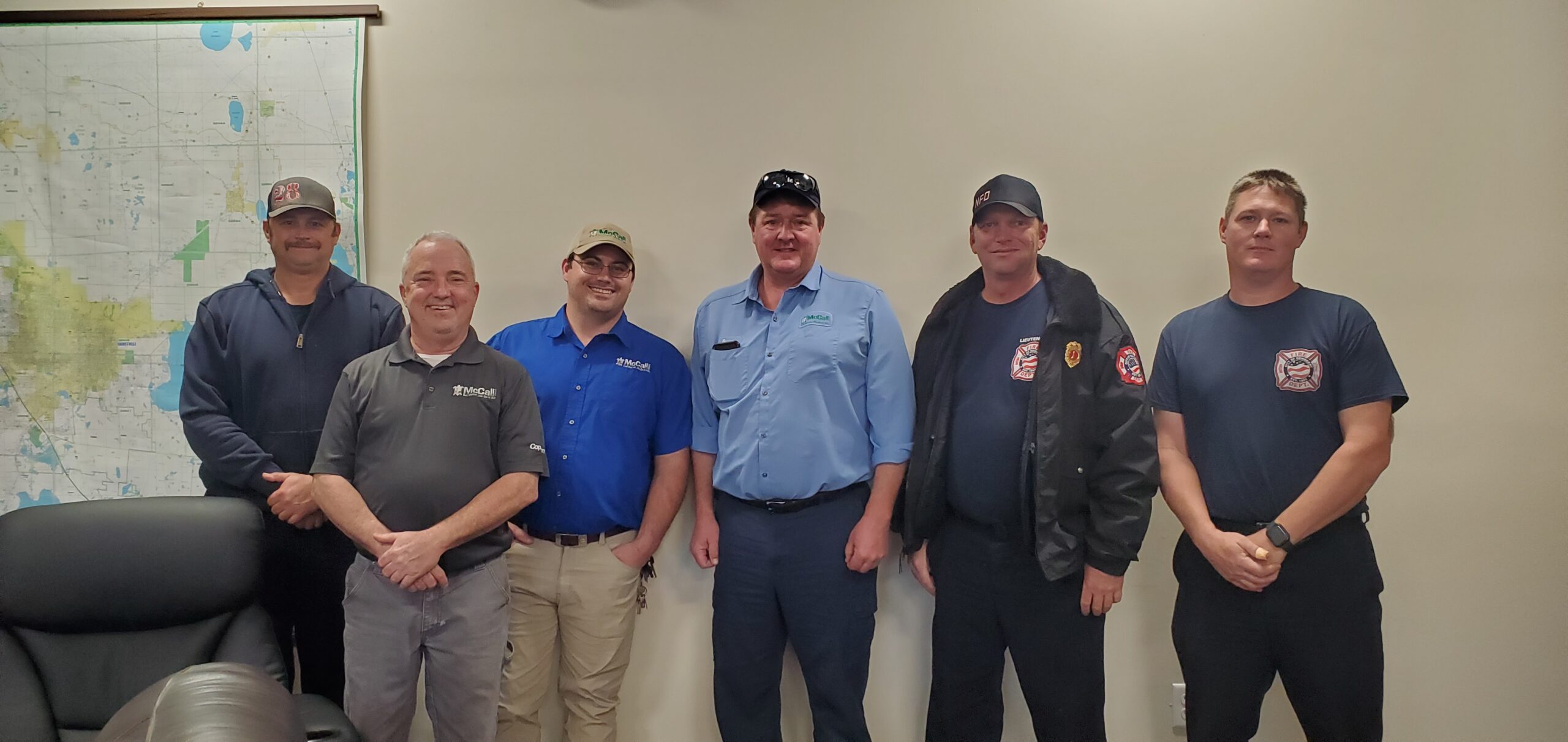 Members of the McCall Pest & Wildlife team with first responders
