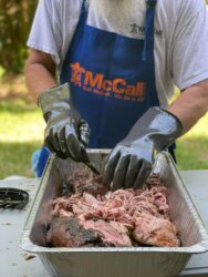 A foil container of barbecued meat